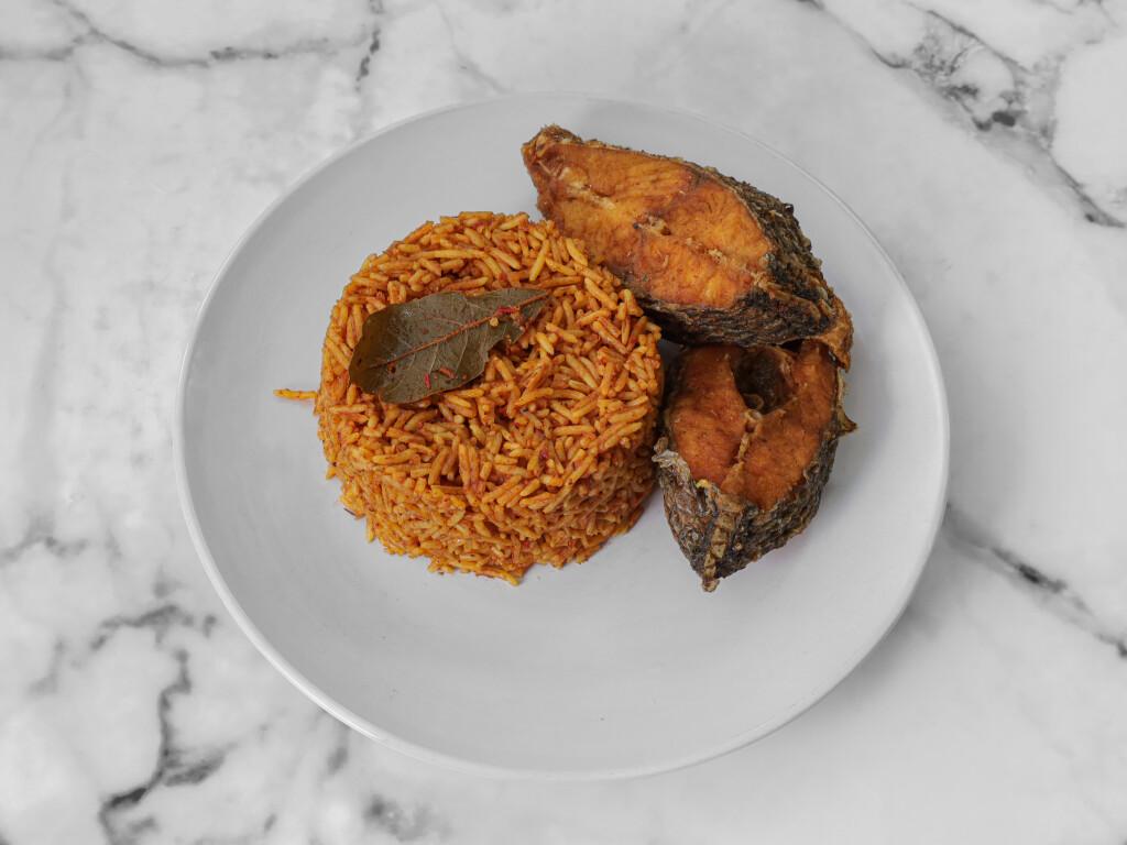 JOLLOF RICE SERVED WITH FRIED FISH